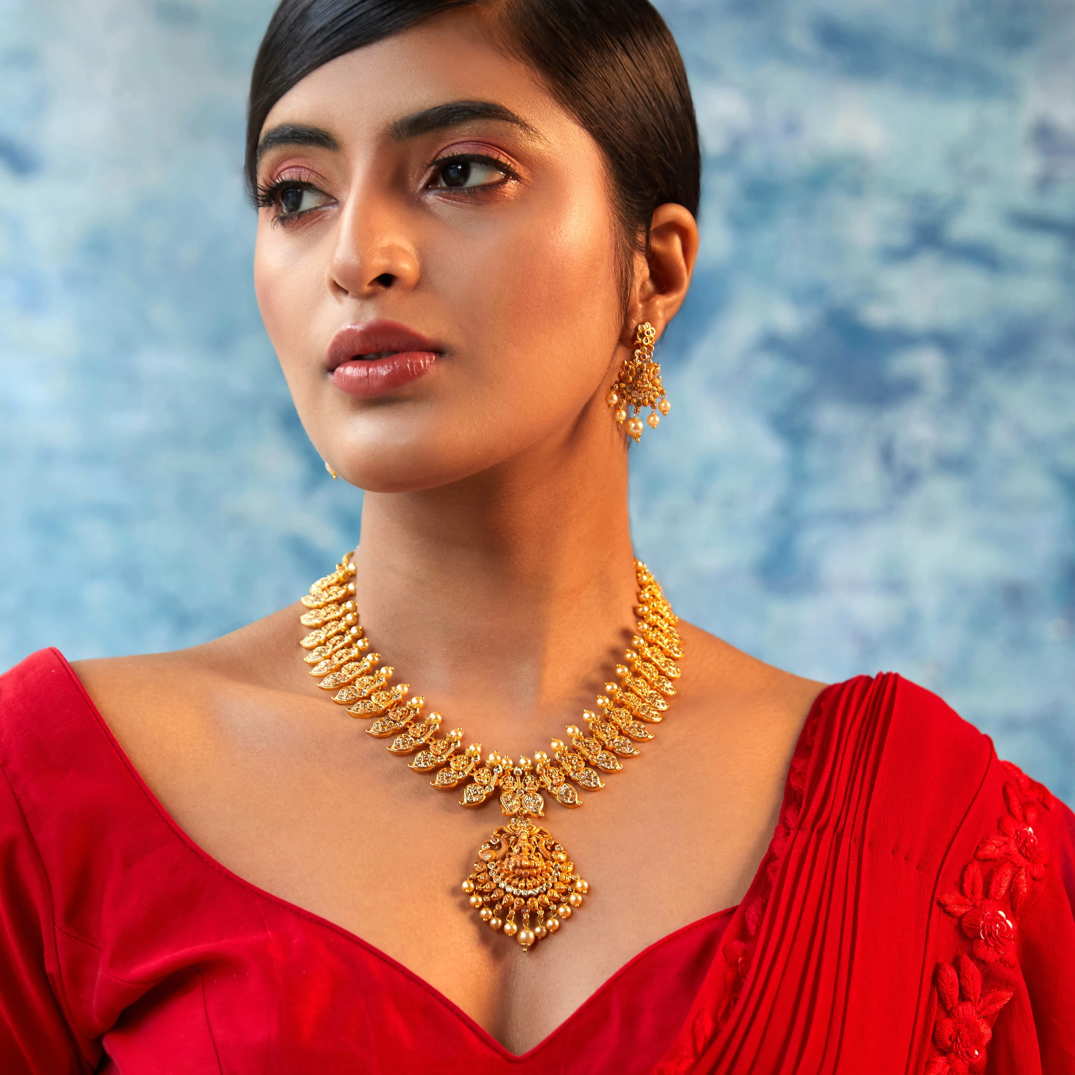 Estele Gold Plated CZ Spiritual Lakshmi Devi Designer Bridal Necklace Set for Women
