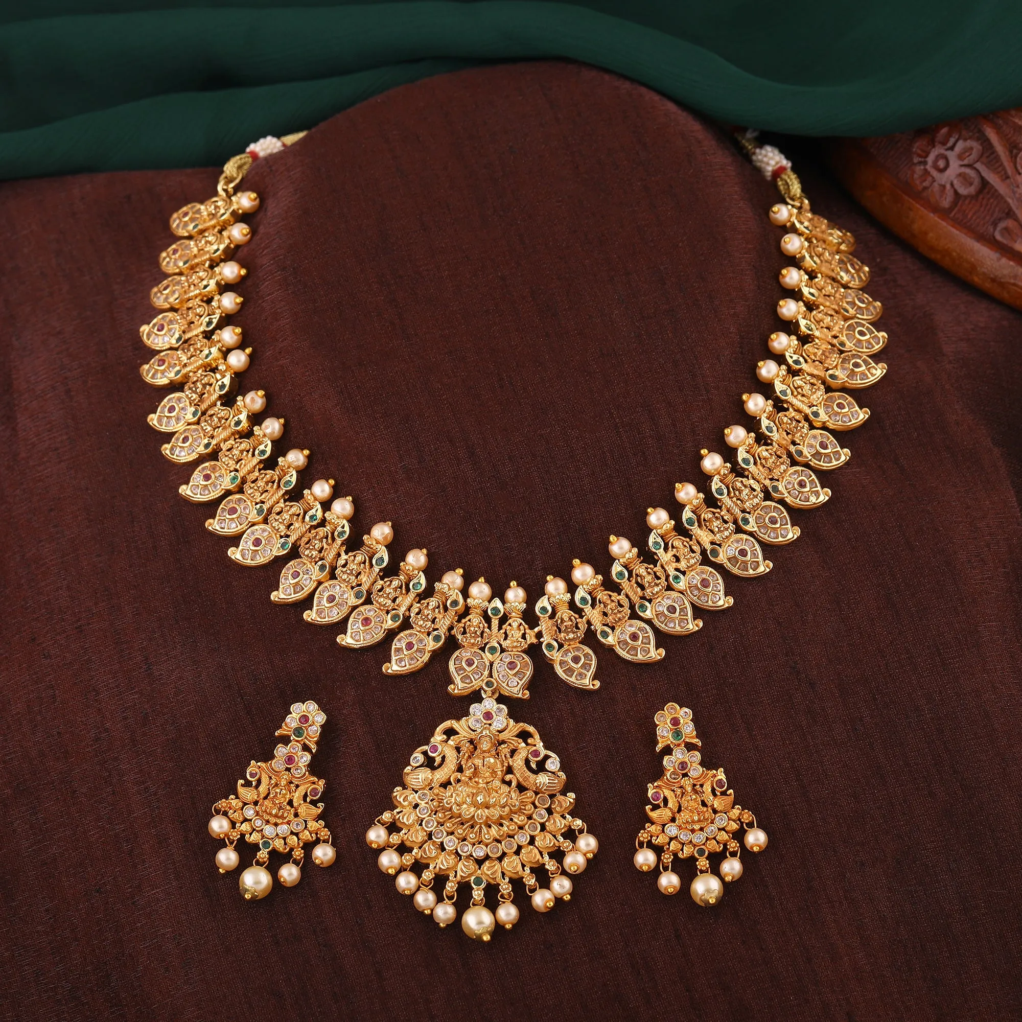 Estele Gold Plated CZ Spiritual Lakshmi Devi Designer Bridal Necklace Set for Women