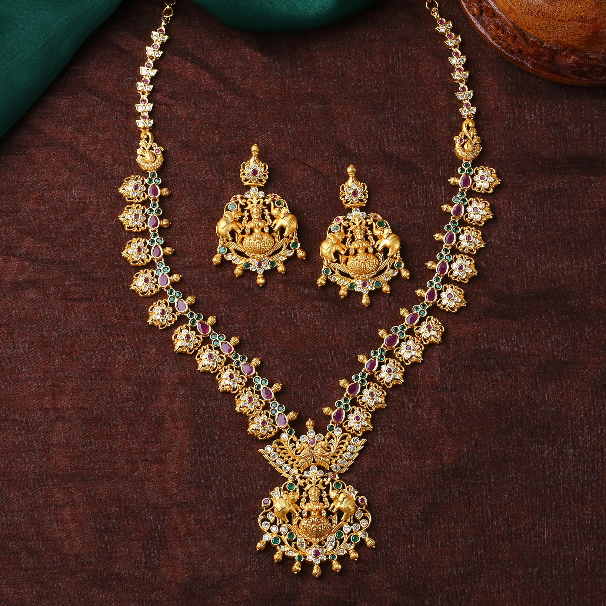 Estele Gold Plated CZ Traditional Laxmi Ji Decorated Bridal Short & Long Necklace Set with Color Stones